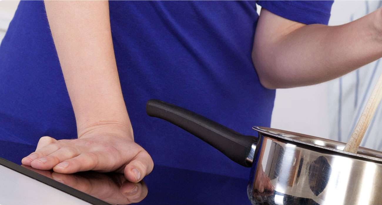 uniknij poparzen dzieki wskaznikowi ciepla resztkowego płyty Candy CI640C
