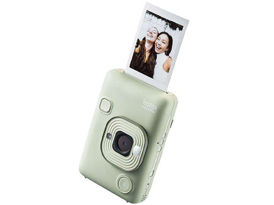 Zielony aparat Fujifilm Instax mini LiPlay drukujący selfie dwóch kobiet