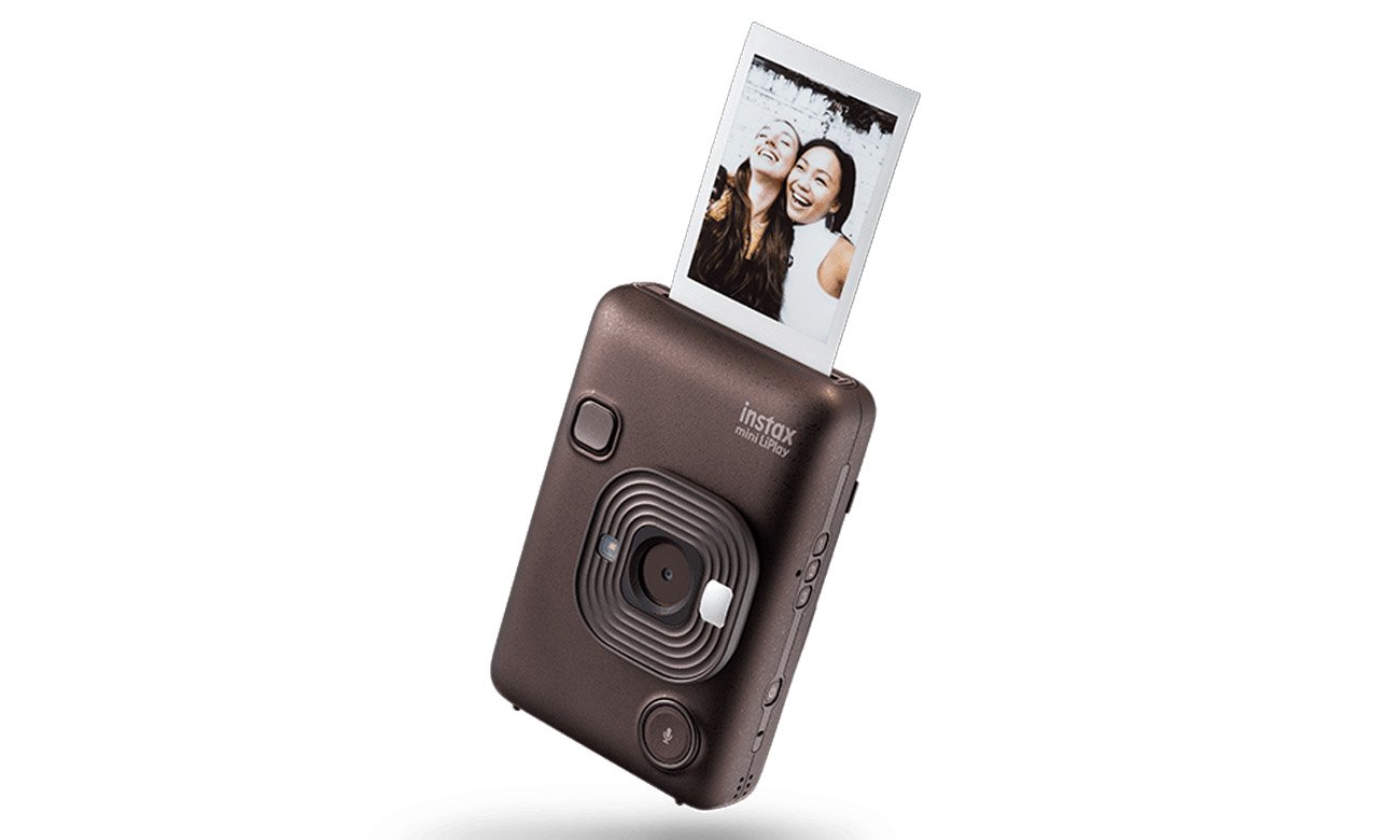 Aparat Fujifilm Instax mini LiPlay drukujący zdjęcie dwóch uśmiechniętych kobiet