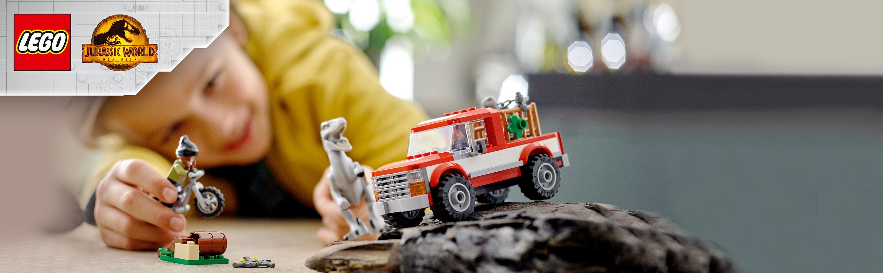 Pełen akcji zestaw z dinozaurami i furgonetką